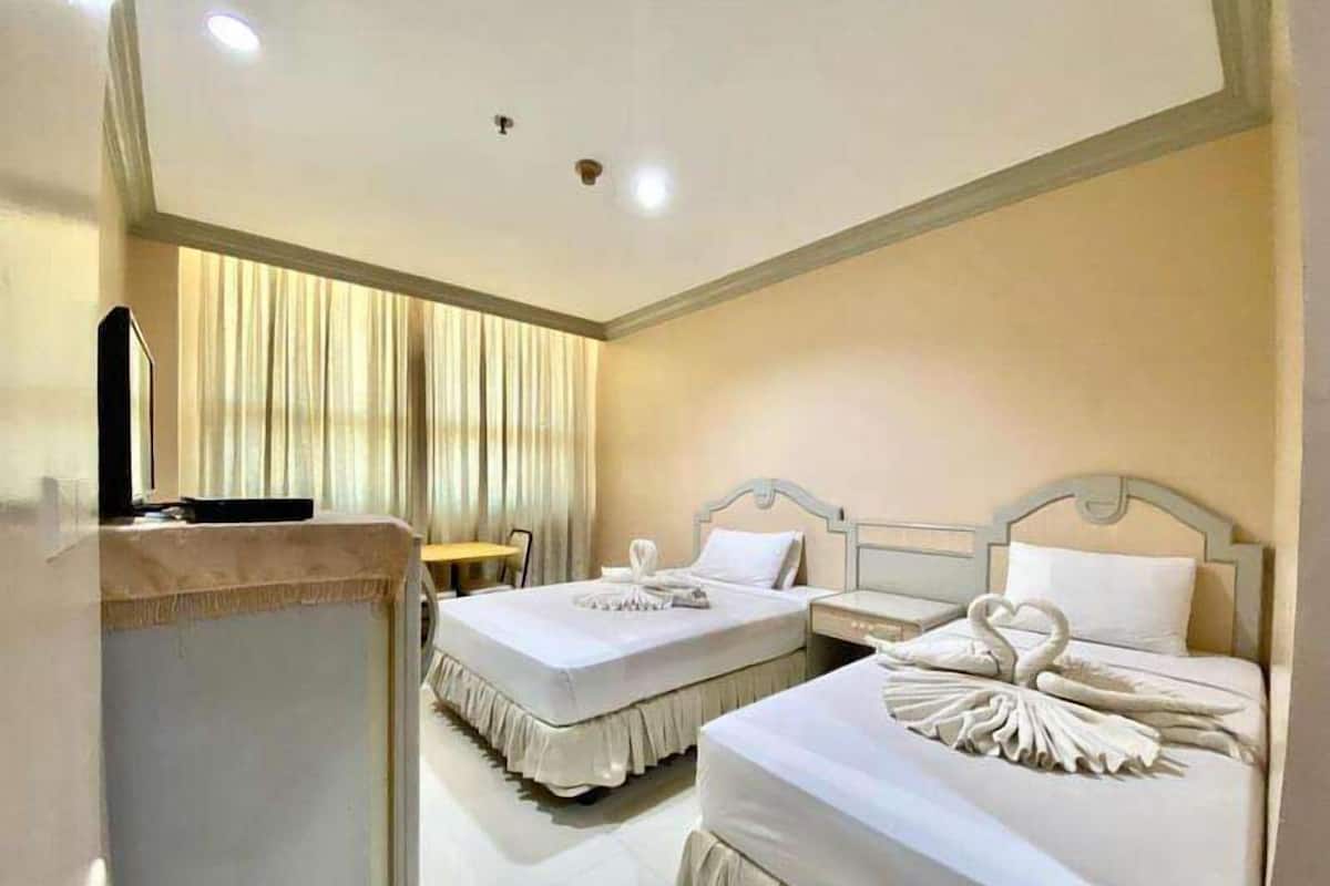 ห้องสวีท | เตียงพร้อมฟูกเสริมที่นอน, มินิบาร์, ตู้นิรภัยในห้องพัก