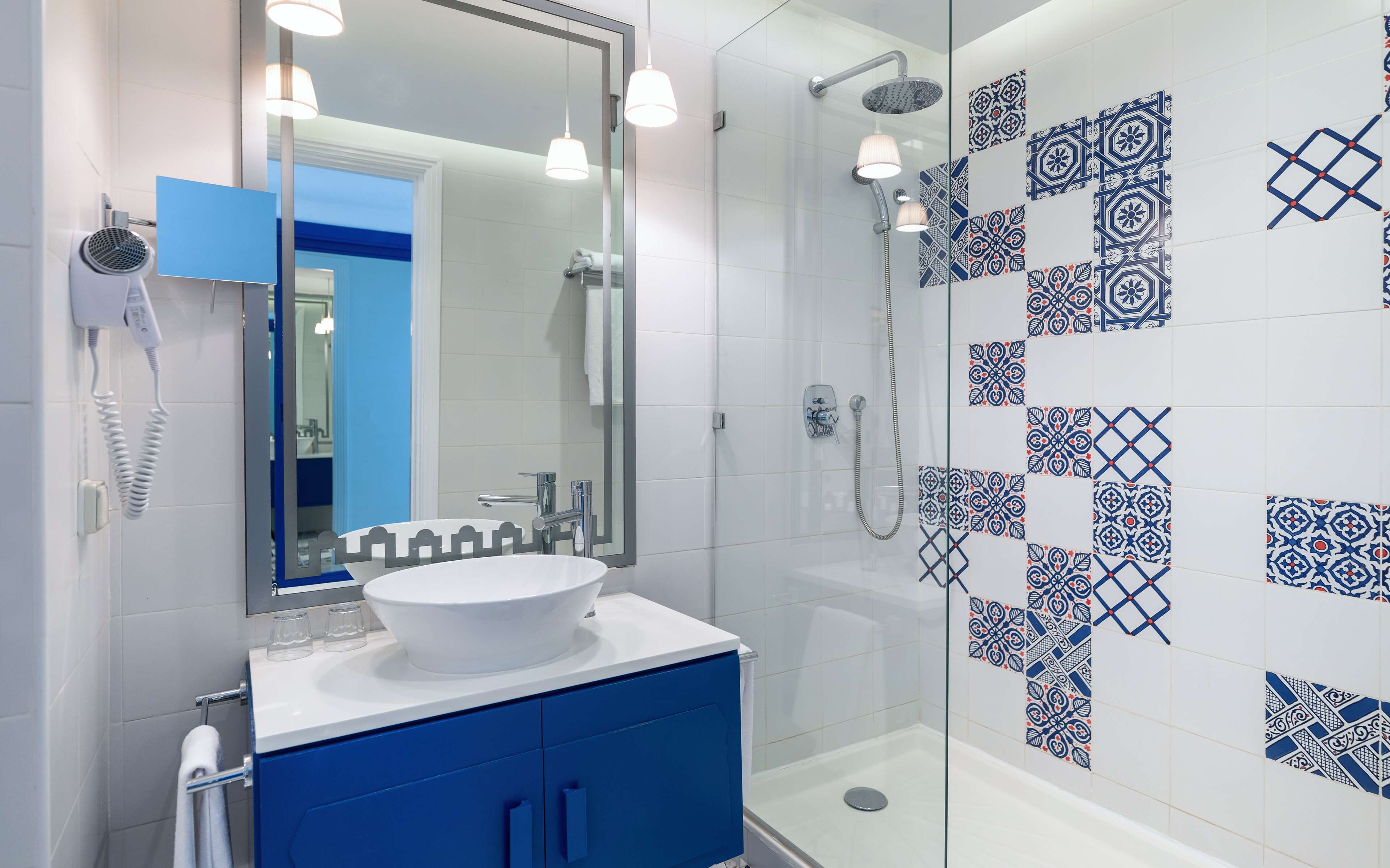 free toiletries, hair dryer, slippers, towels