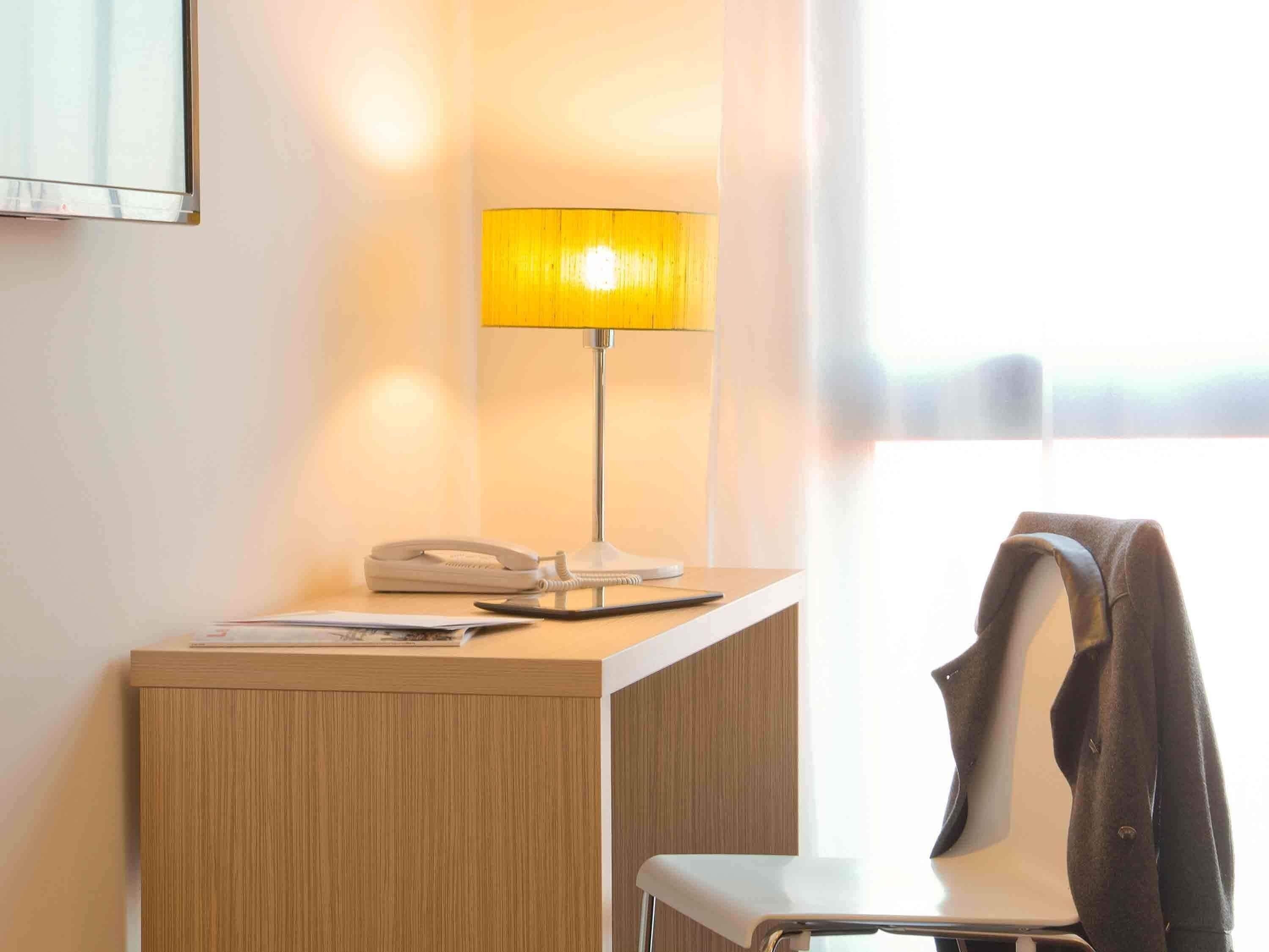 Individually furnished, desk, laptop workspace, blackout curtains