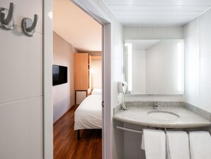 Apartment (Triple), (1 Double and 1 Single Bed) | Minibar, soundproofing, iron/ironing board, free WiFi