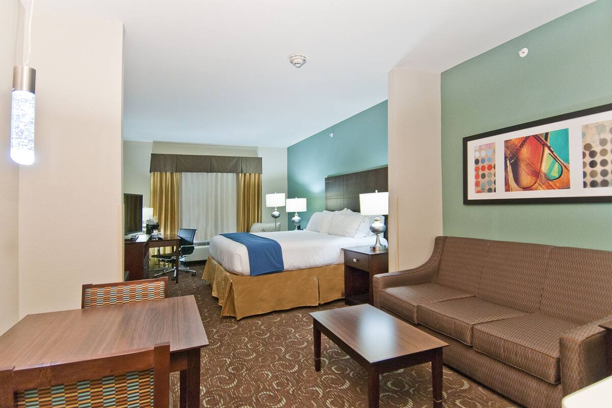 suite, 1 king bed with sofa bed (additional living area) | 1 bedroom, desk, blackout curtains, iron/ironing board