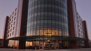 A modern hotel with a curved glass facade and a prominent "MARGI HOTEL" sign. - Margi Hotel (Edirne)
