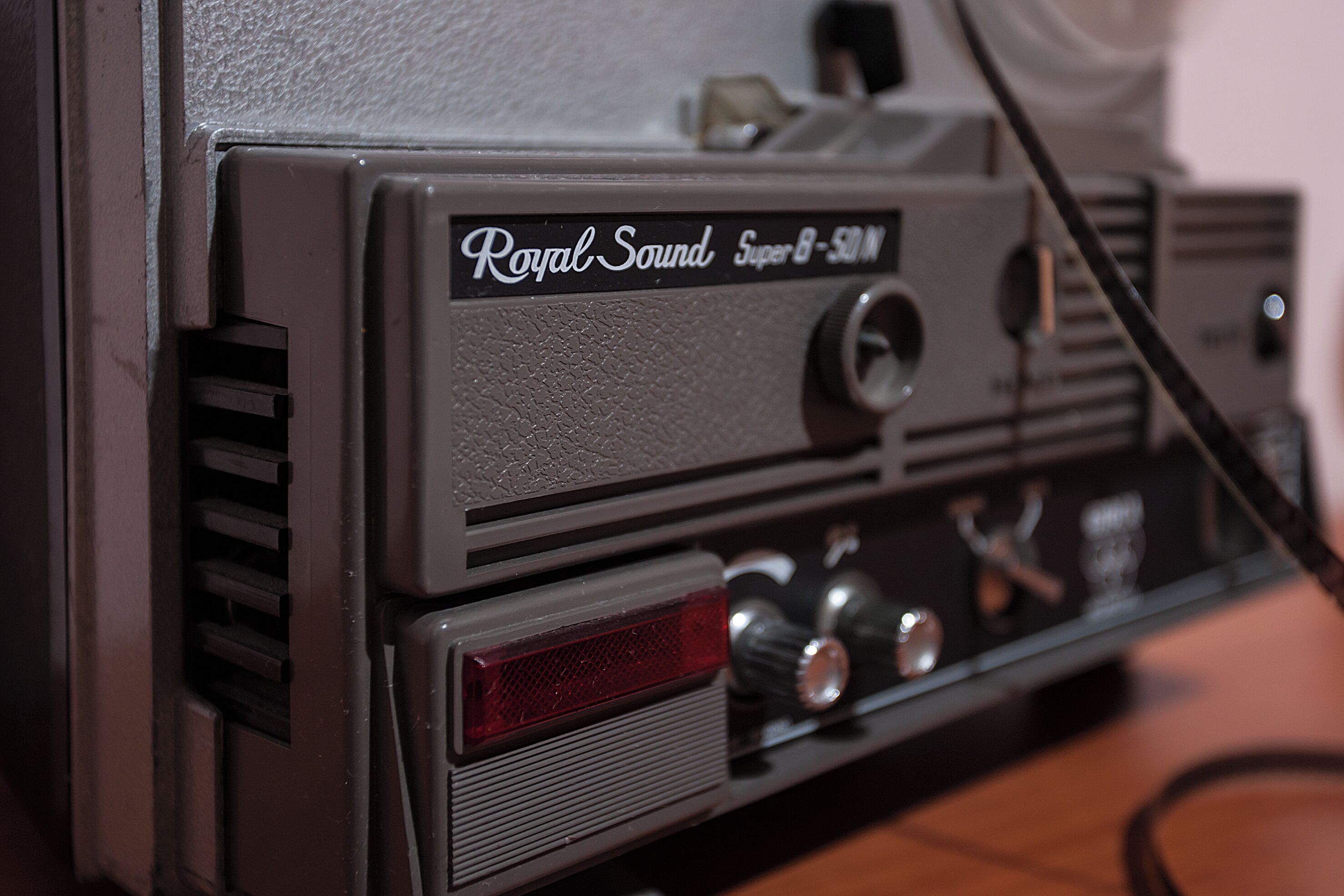 A vintage Royal-Sound Super B-50 N audio device with knobs and a speaker grille.