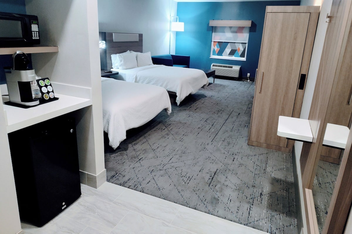 Suite, 2 Queen Beds | Desk, blackout drapes, iron/ironing board, free WiFi