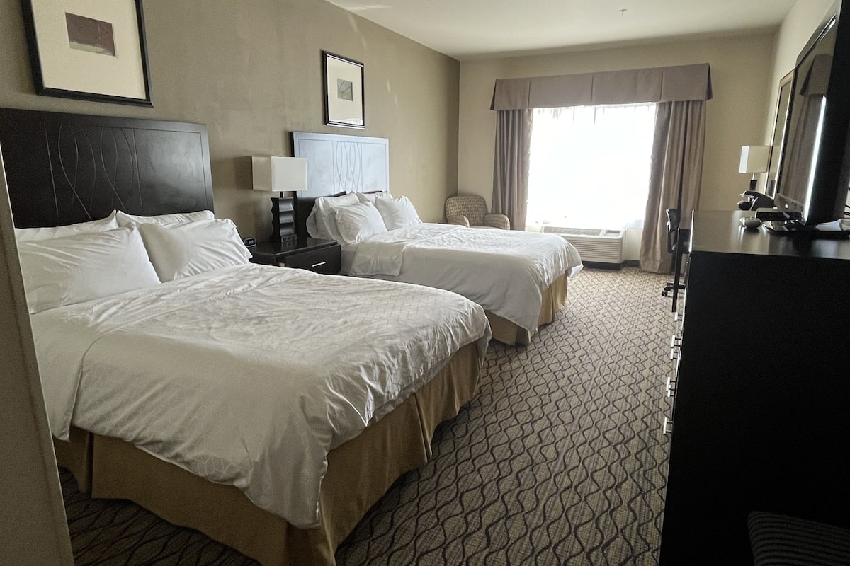 desk, blackout curtains, iron/ironing board, free cots/infant beds