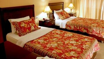 Standard Double Room | Minibar, in-room safe, blackout drapes, cribs/infant beds