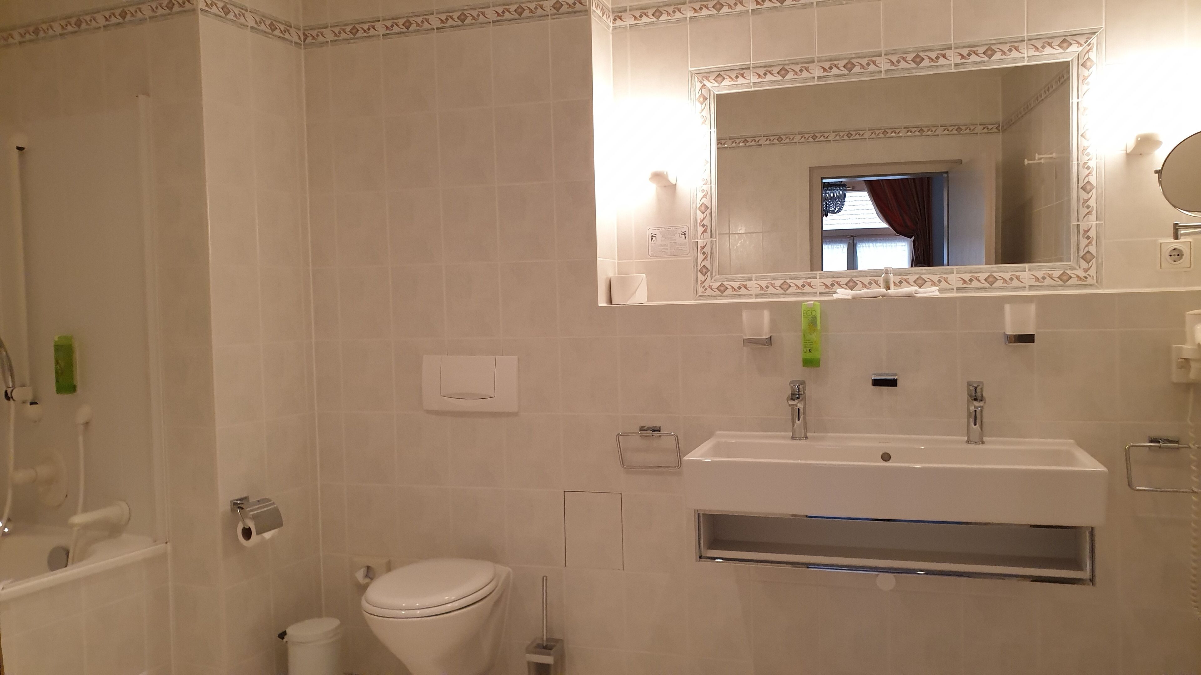 superior double room | bathroom | free toiletries, hair dryer, towels