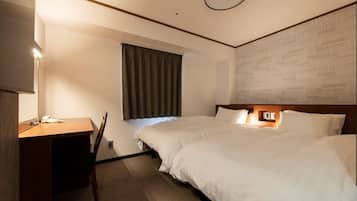 Twin Room, Non Smoking | Down comforters, desk, blackout drapes, iron/ironing board