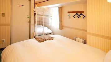 Down comforters, desk, blackout drapes, iron/ironing board