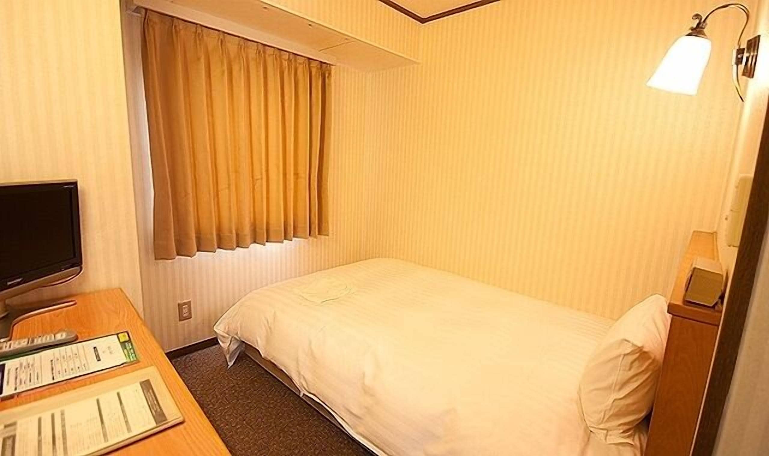 down duvets, desk, blackout curtains, iron/ironing board