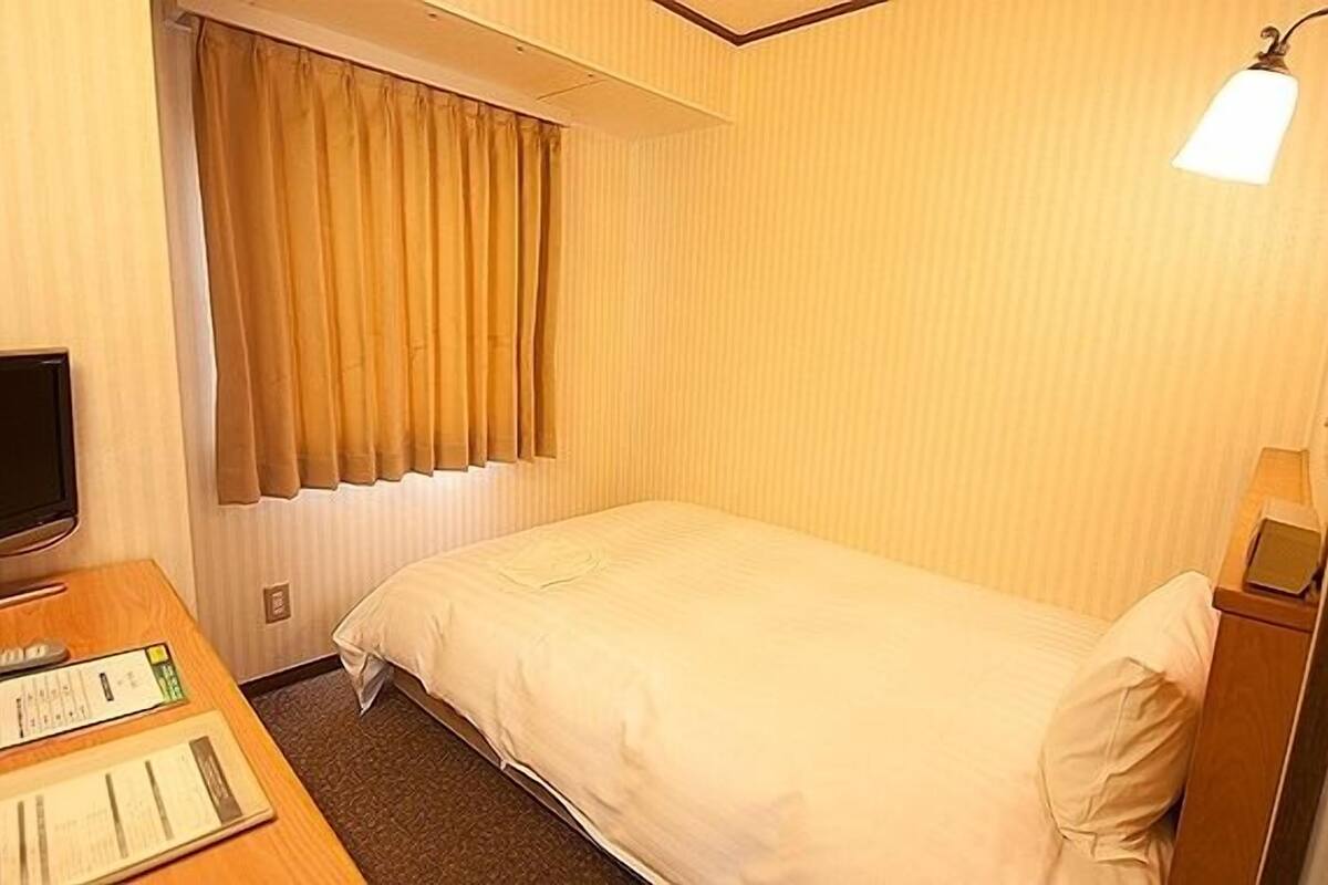 down duvets, desk, blackout curtains, iron/ironing board