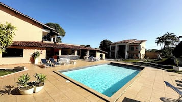 Outdoor pool, open 9:00 AM to 7:00 PM, pool umbrellas, pool loungers