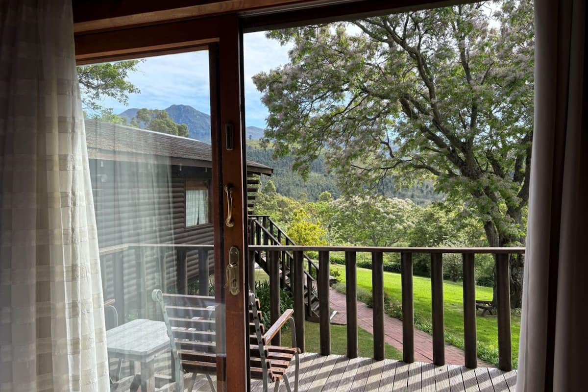 double/twin rooms - swiss village cabins | balcony view