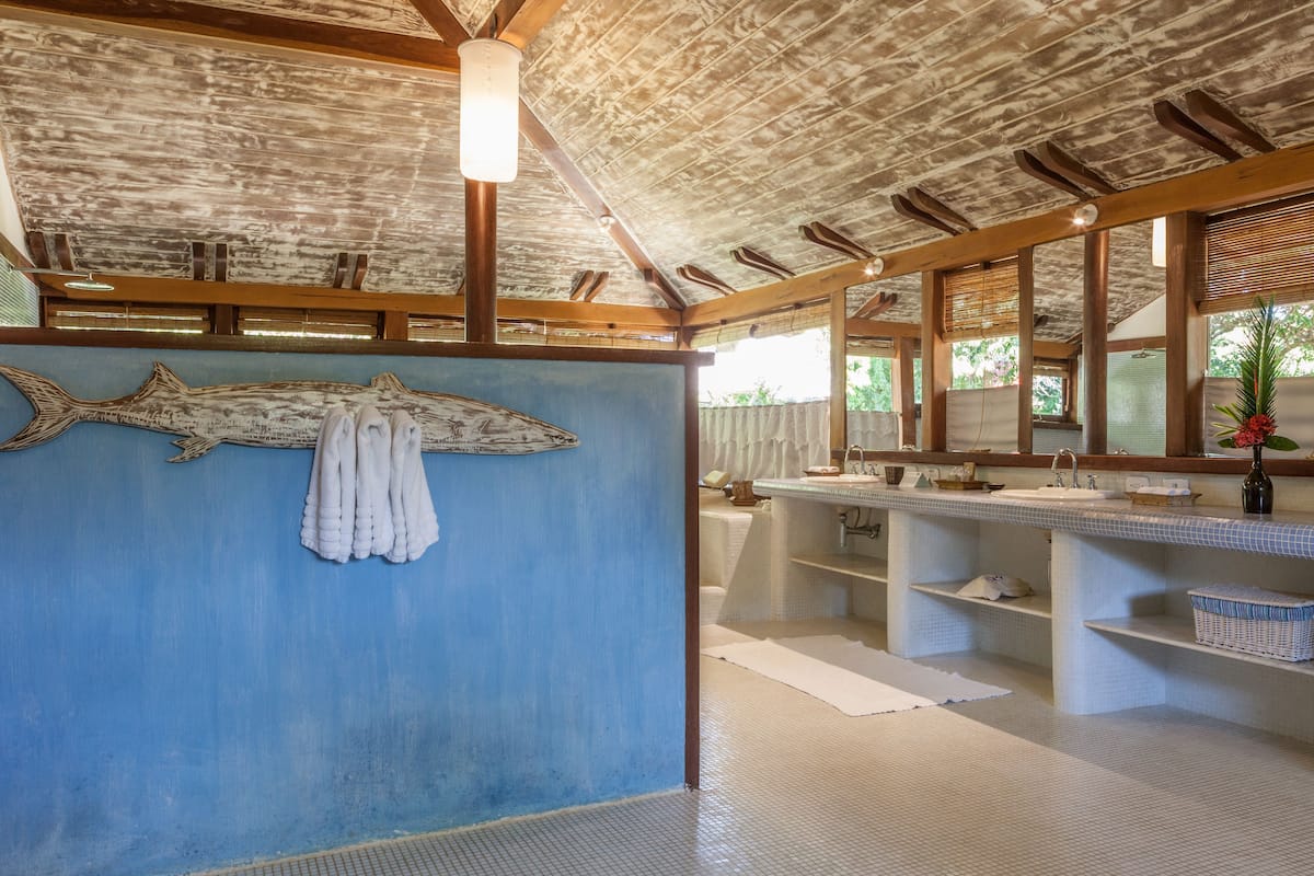 bungalow estrela | bathroom | designer toiletries, hair dryer, bathrobes, towels