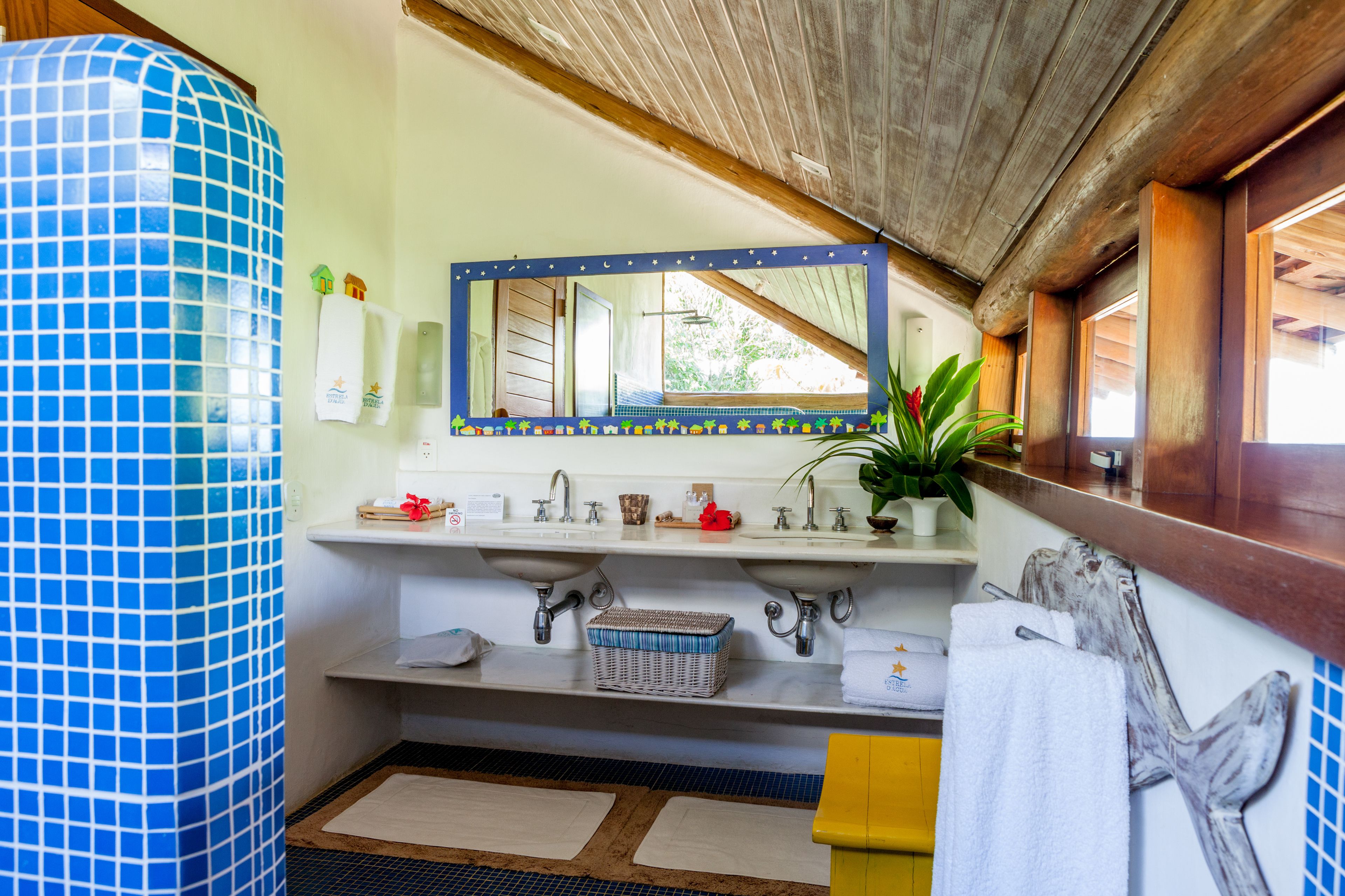 bungalow da costa | bathroom | designer toiletries, hair dryer, bathrobes, towels