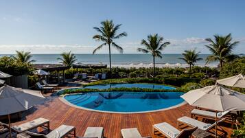 2 outdoor pools, open 9:00 AM to 6:00 PM, pool umbrellas