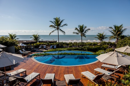 2 outdoor pools, open 9:00 AM to 6:00 PM, pool umbrellas