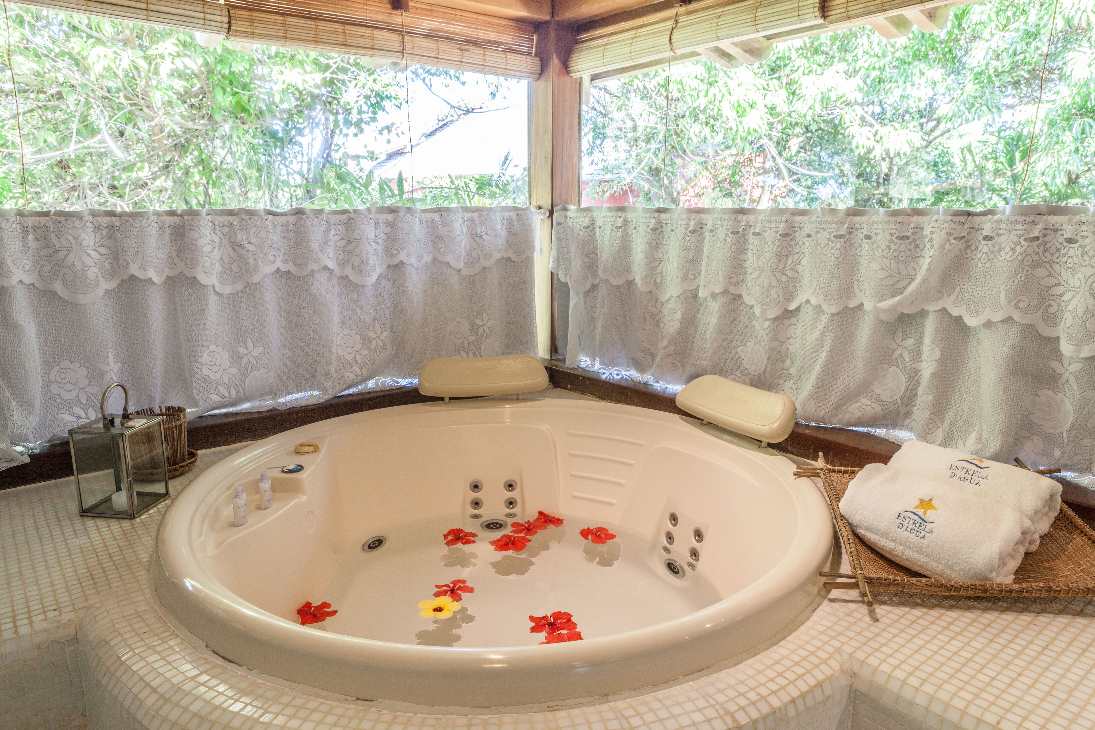 bungalow estrela | bathroom | designer toiletries, hair dryer, bathrobes, towels