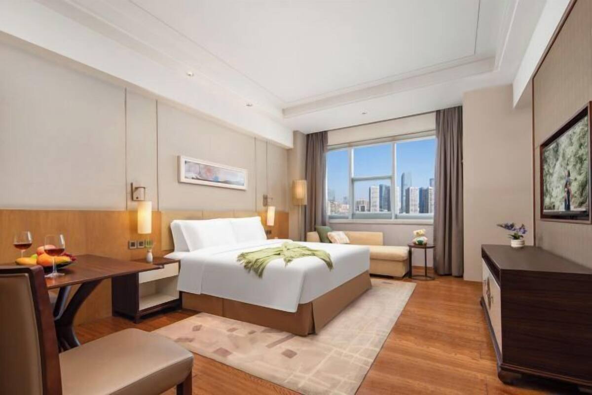 Free minibar items, in-room safe, laptop workspace, blackout curtains