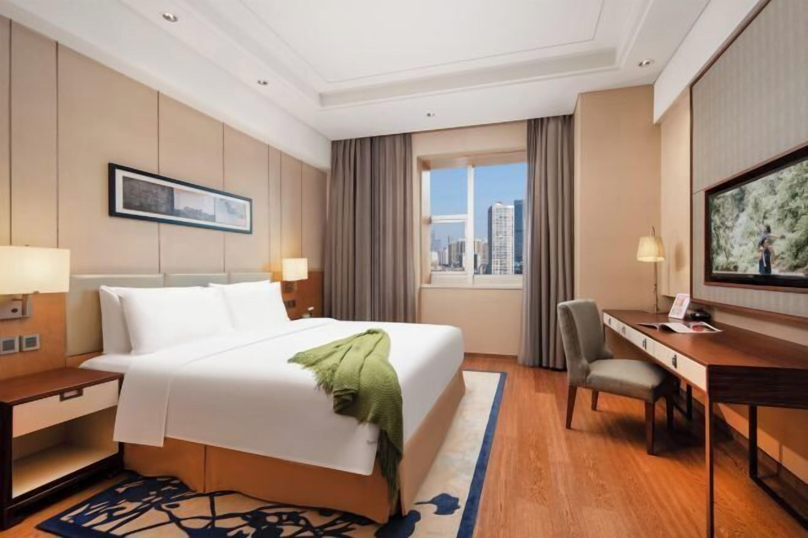 Free minibar items, in-room safe, laptop workspace, blackout curtains