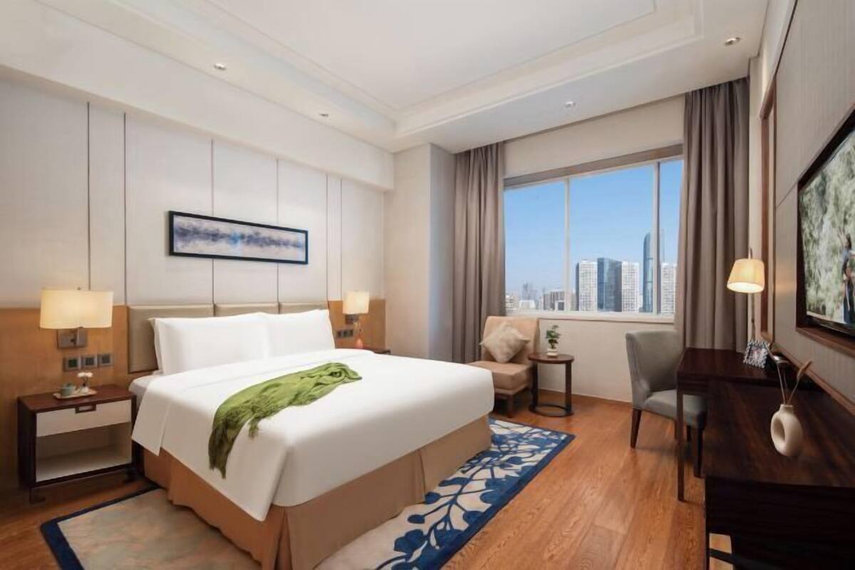 Free minibar items, in-room safe, laptop workspace, blackout curtains