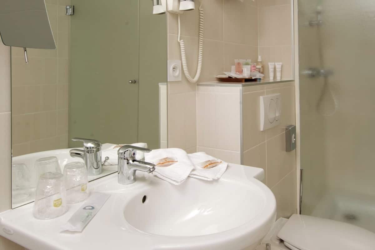 eco-friendly toiletries, hair dryer, bathrobes, slippers