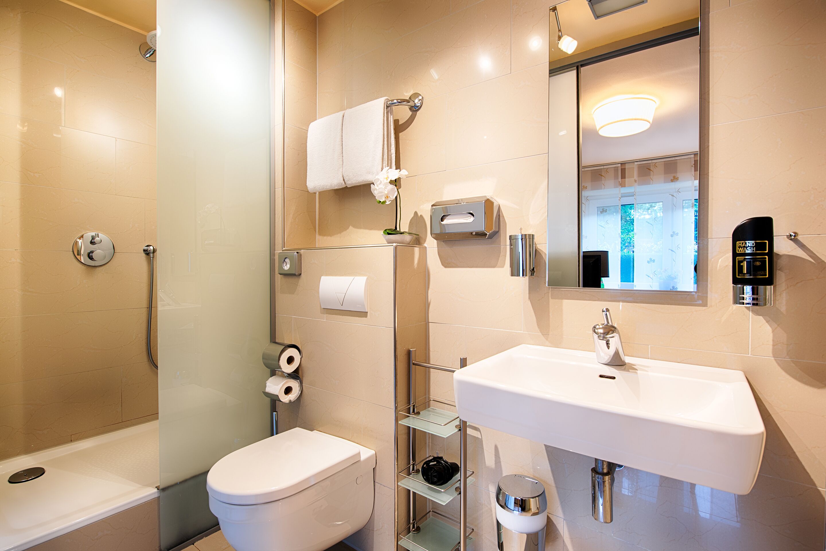 shower, free toiletries, hair dryer, towels