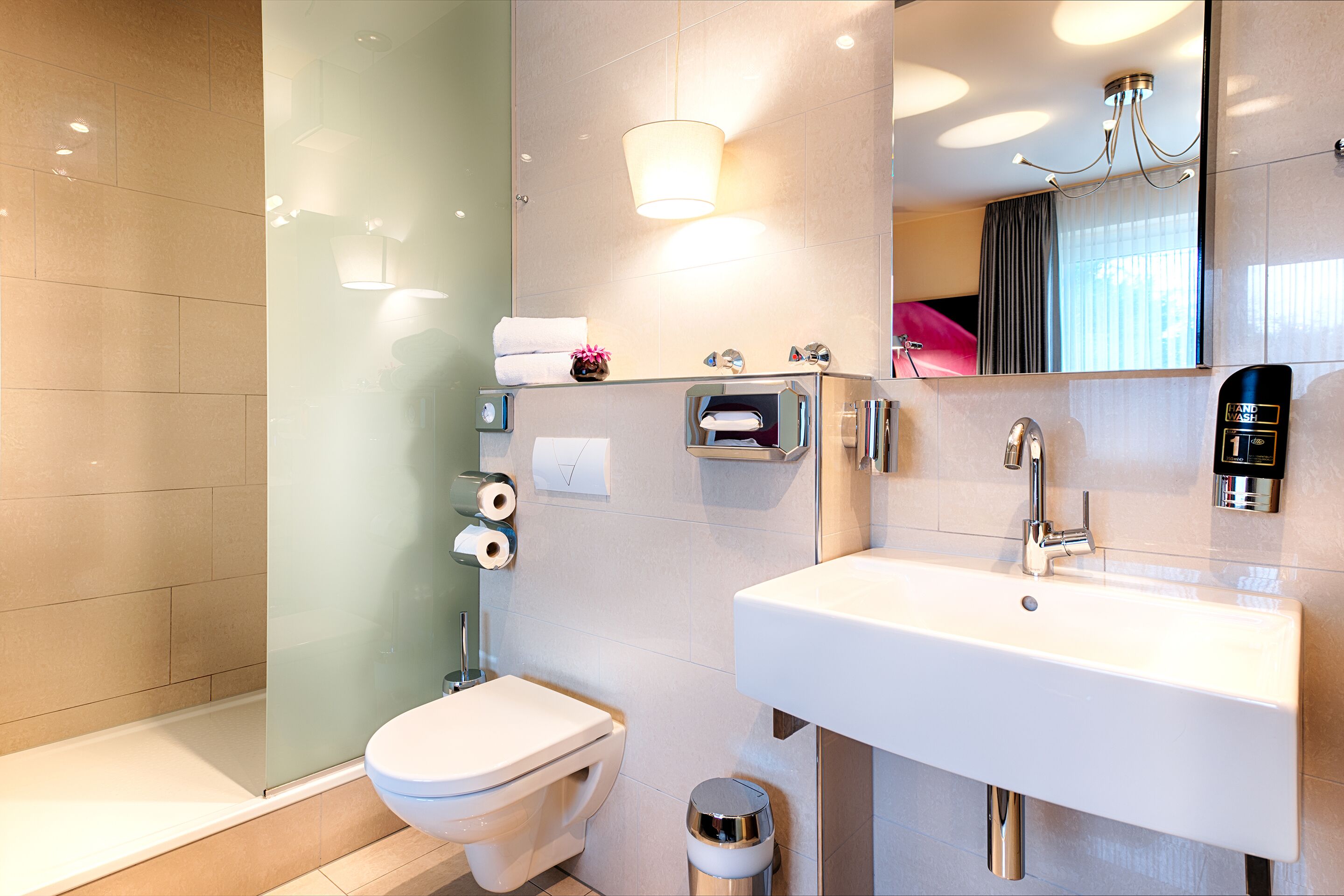 shower, free toiletries, hair dryer, towels