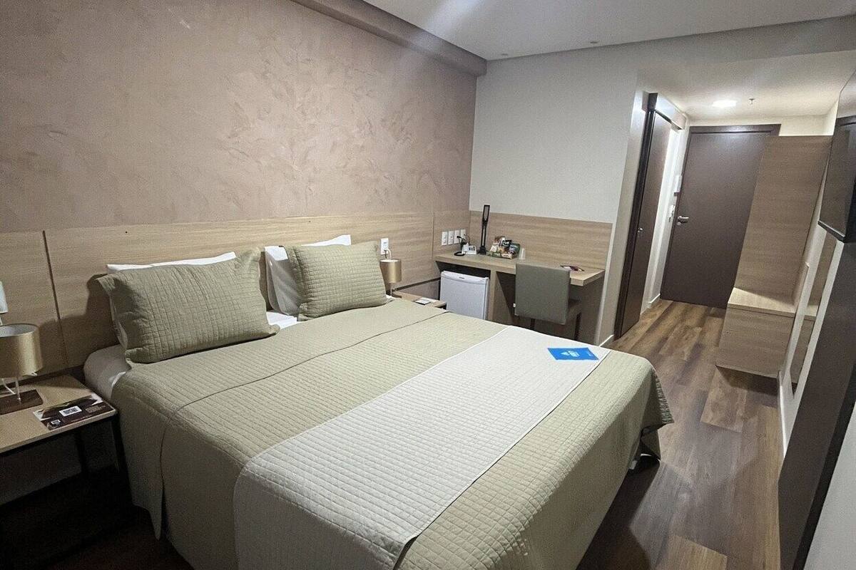 Minibar, desk, laptop workspace, blackout curtains