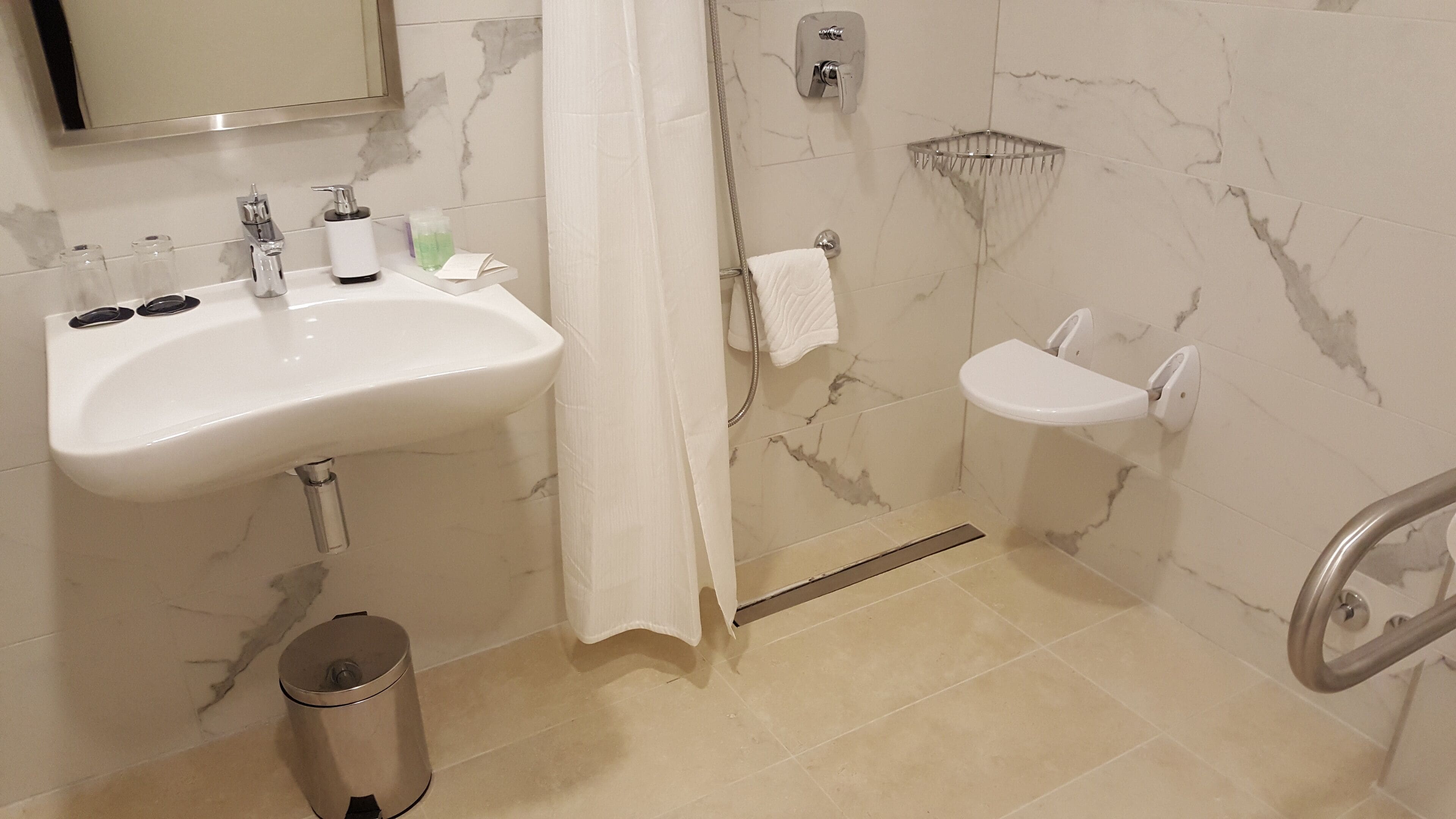 classic accessible room | bathroom | free toiletries, hair dryer, bathrobes, slippers