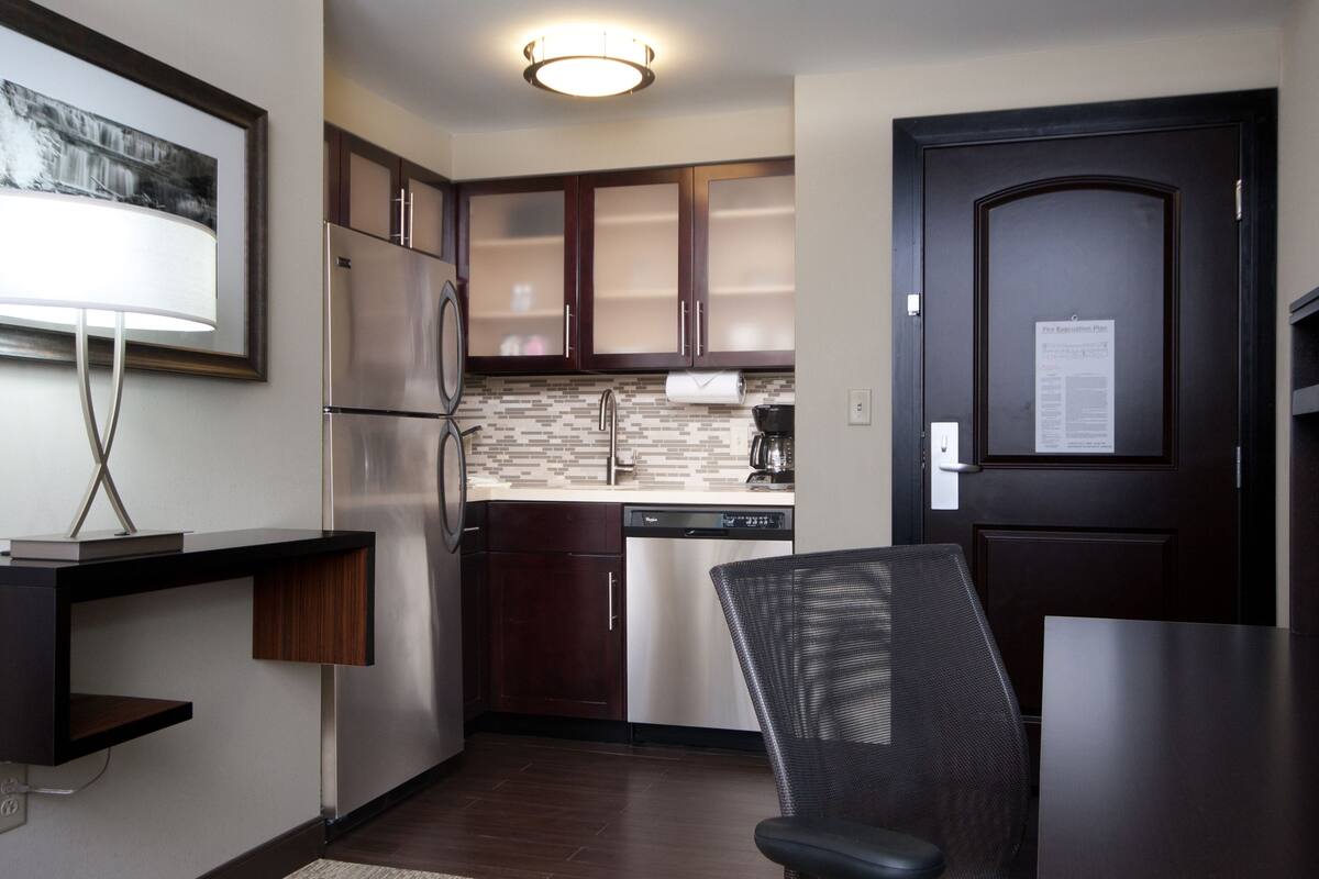 Studio Suite, 1 King Bed, Kitchen | In-room safe, desk, soundproofing, iron/ironing board