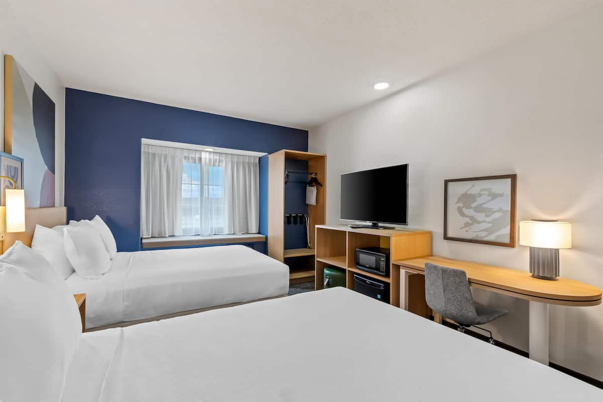 Desk, laptop workspace, blackout curtains, iron/ironing board