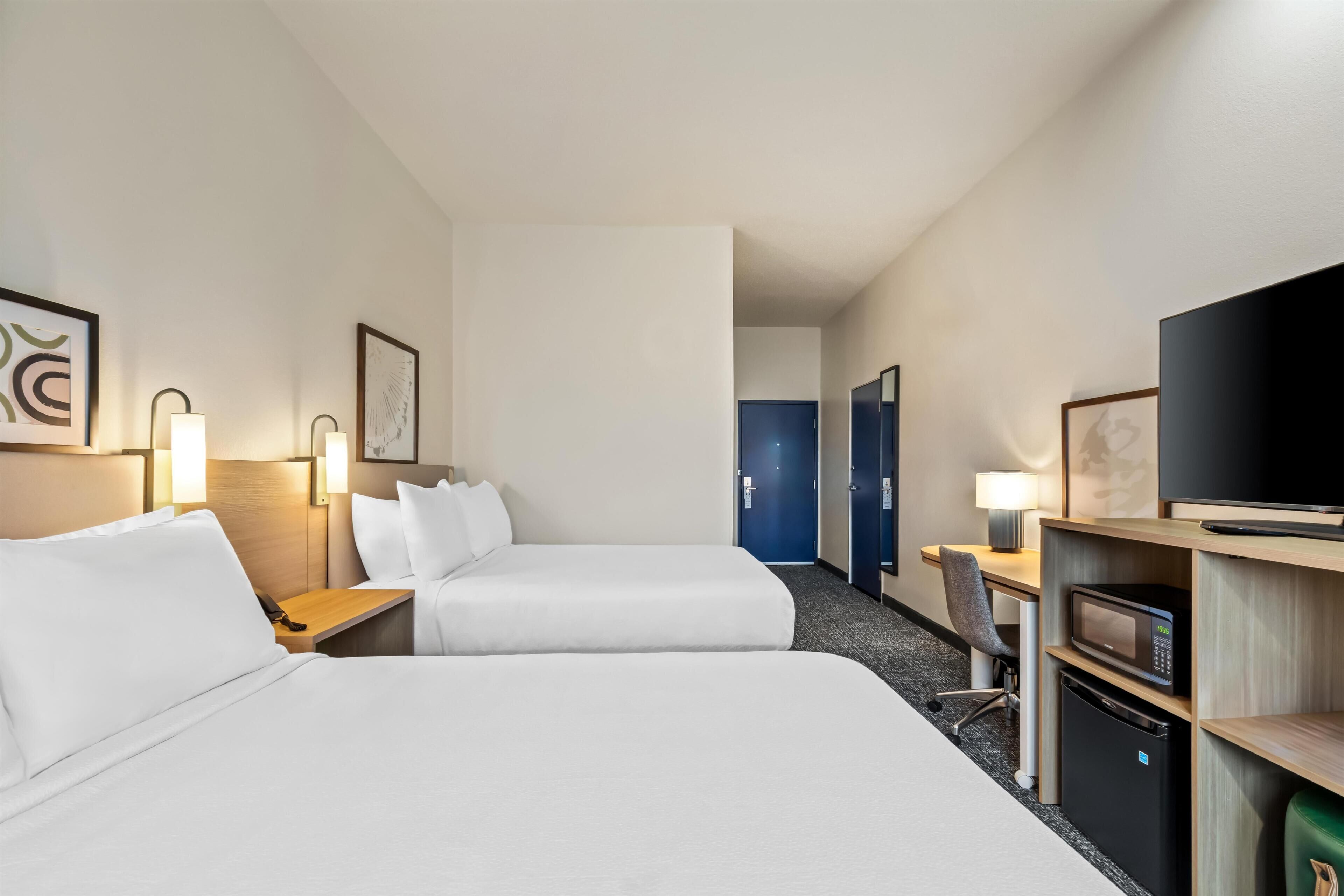 Room, 2 Queen Beds, Accessible (Mobility & Hearing, Roll-in Shower) | Desk, laptop workspace, blackout drapes, iron/ironing board