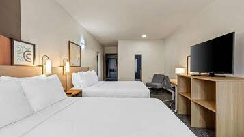 Suite, Multiple Beds | Desk, laptop workspace, blackout drapes, iron/ironing board