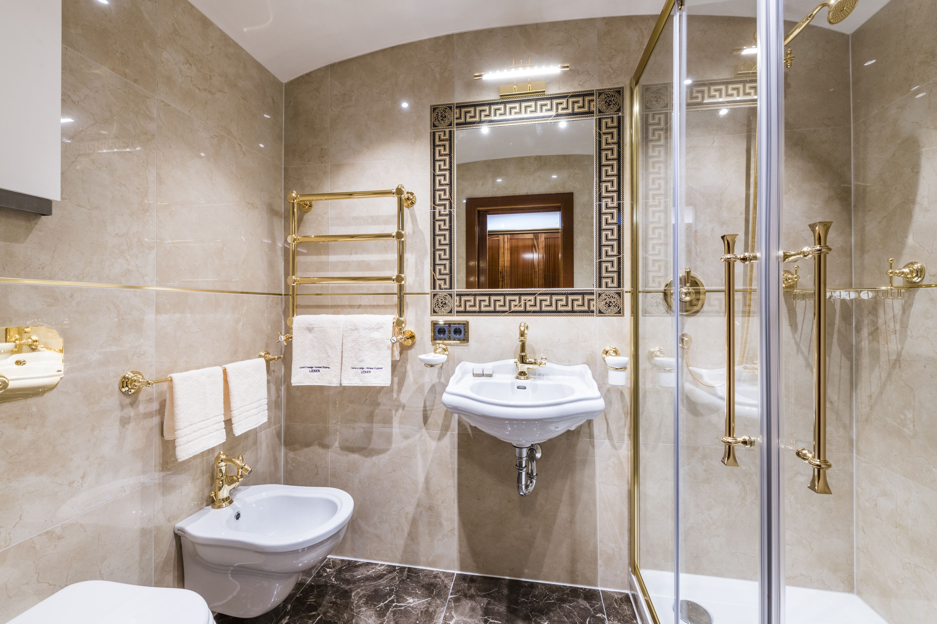 luxury suite | bathroom | shower, hair dryer, towels, soap