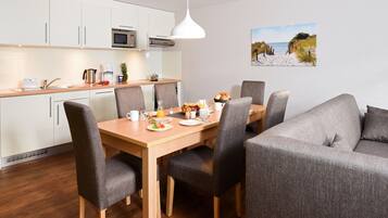 4-Room Apartment | Living area | 32-inch flat-screen TV with satellite channels, TV