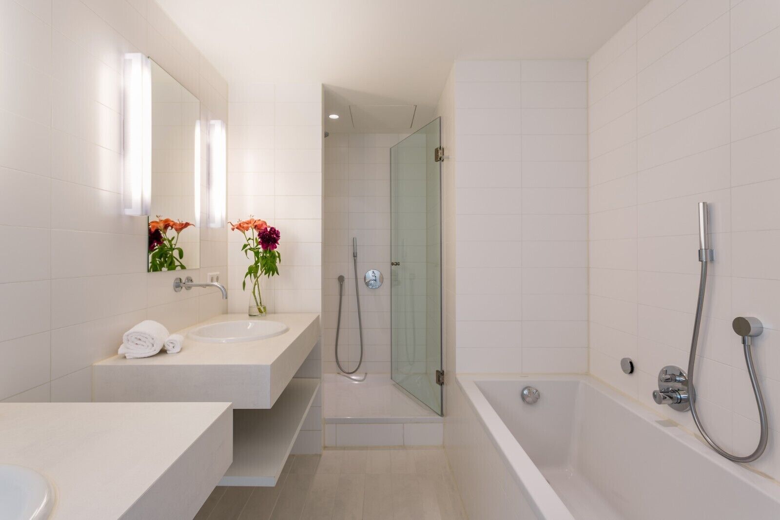 junior suite | bathroom | eco-friendly toiletries, hair dryer, towels