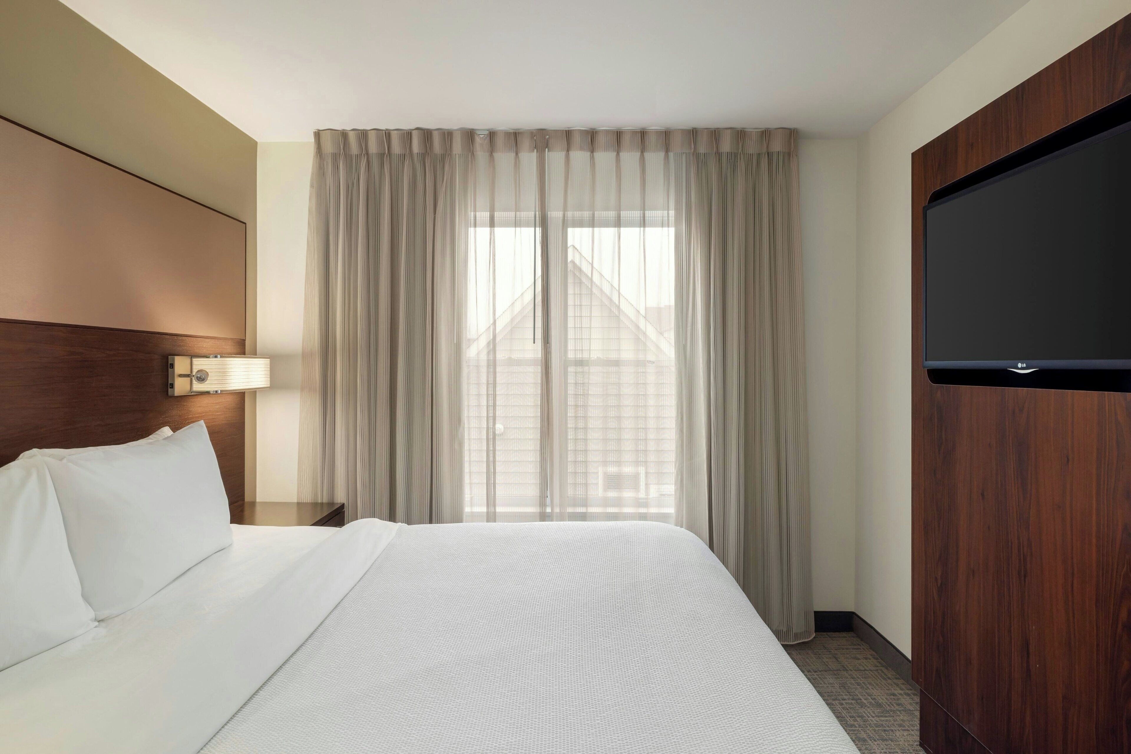 one-bedroom suite, 1 king bed with sofa bed | premium bedding, desk, laptop workspace, blackout curtains