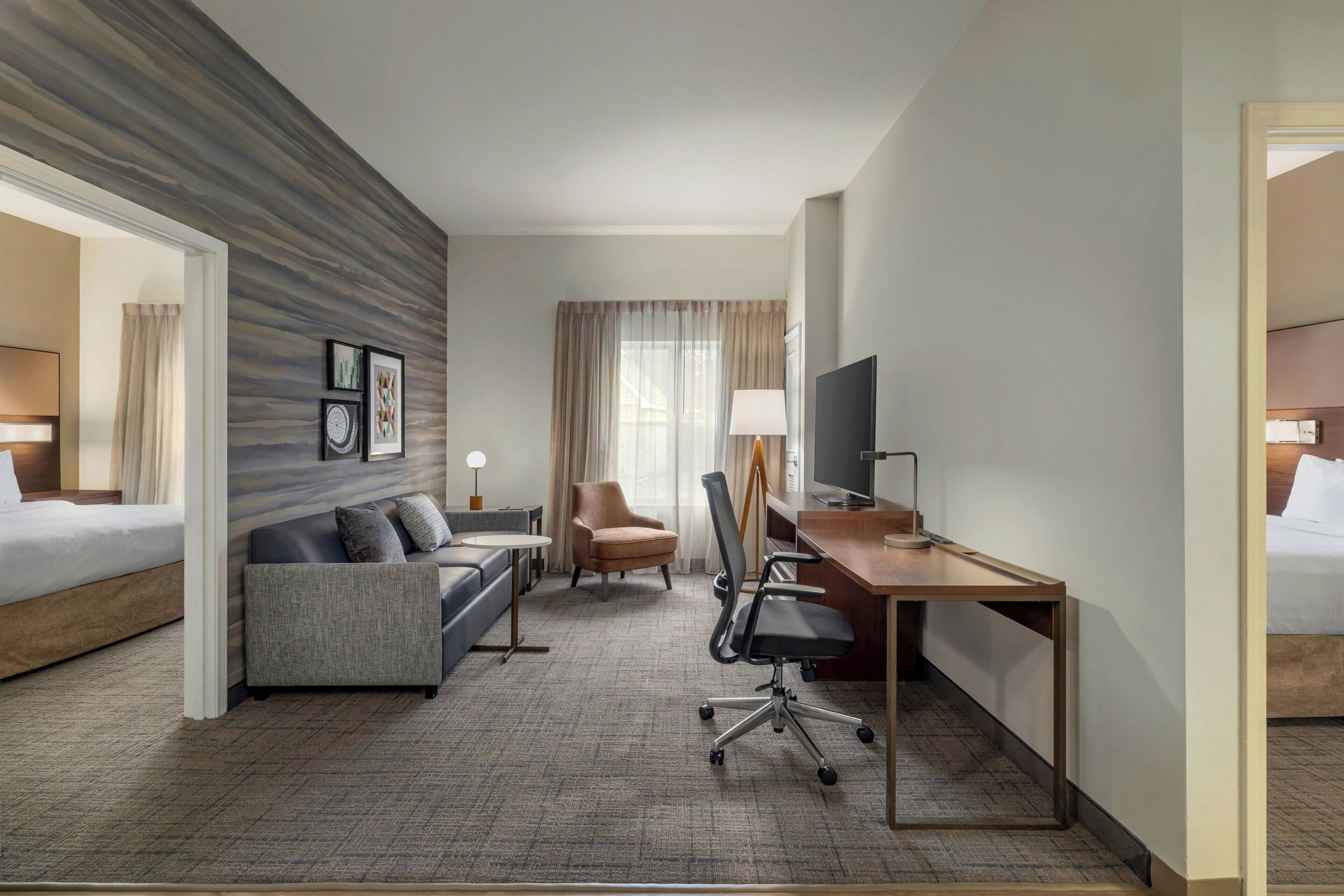 two-bedroom suite, 1 king bedroom, 1 queen bedroom, | living area | 37-inch tv with cable channels