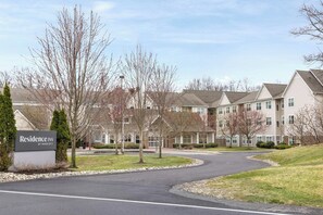A residential complex with a sign for 'Residence Inn by Marriott'.