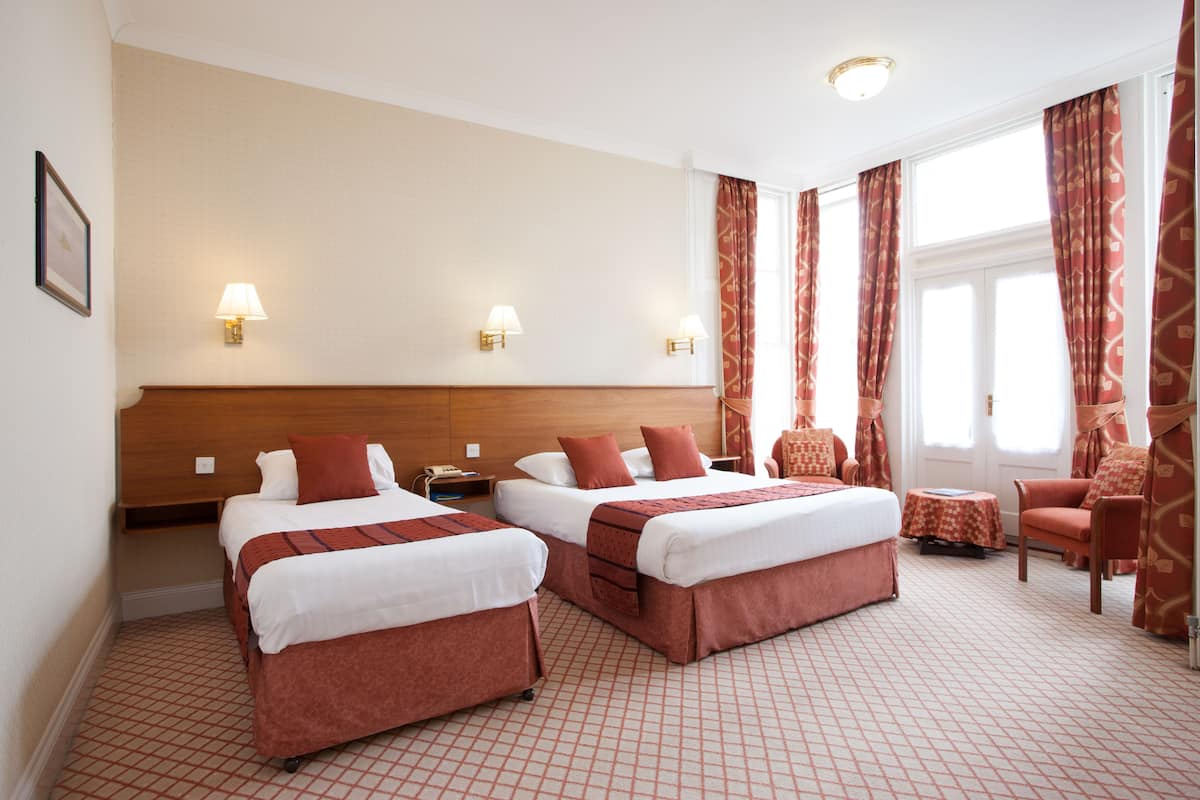 Family Triple Room (2 Adults + 1 Child) | In-room safe, desk, WiFi (free), bed sheets