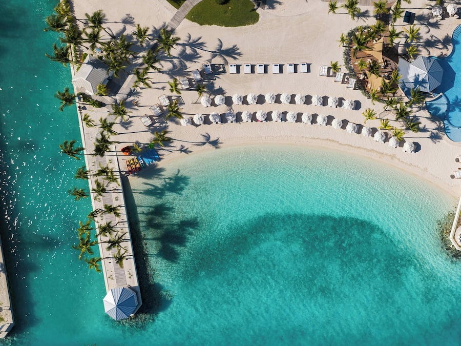Private beach, white sand, sun loungers, beach umbrellas