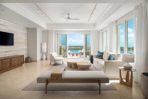 Two Bedroom Oceanfront Terrace Penthouse | Living room | Flat-screen TV - Blue Haven Resort - All-Inclusive (Providenciales)