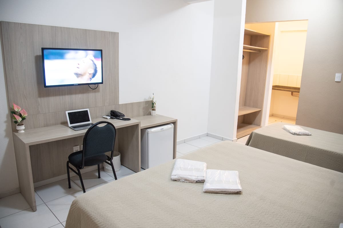 Superior Triple Room | Minibar, desk, blackout drapes, free WiFi