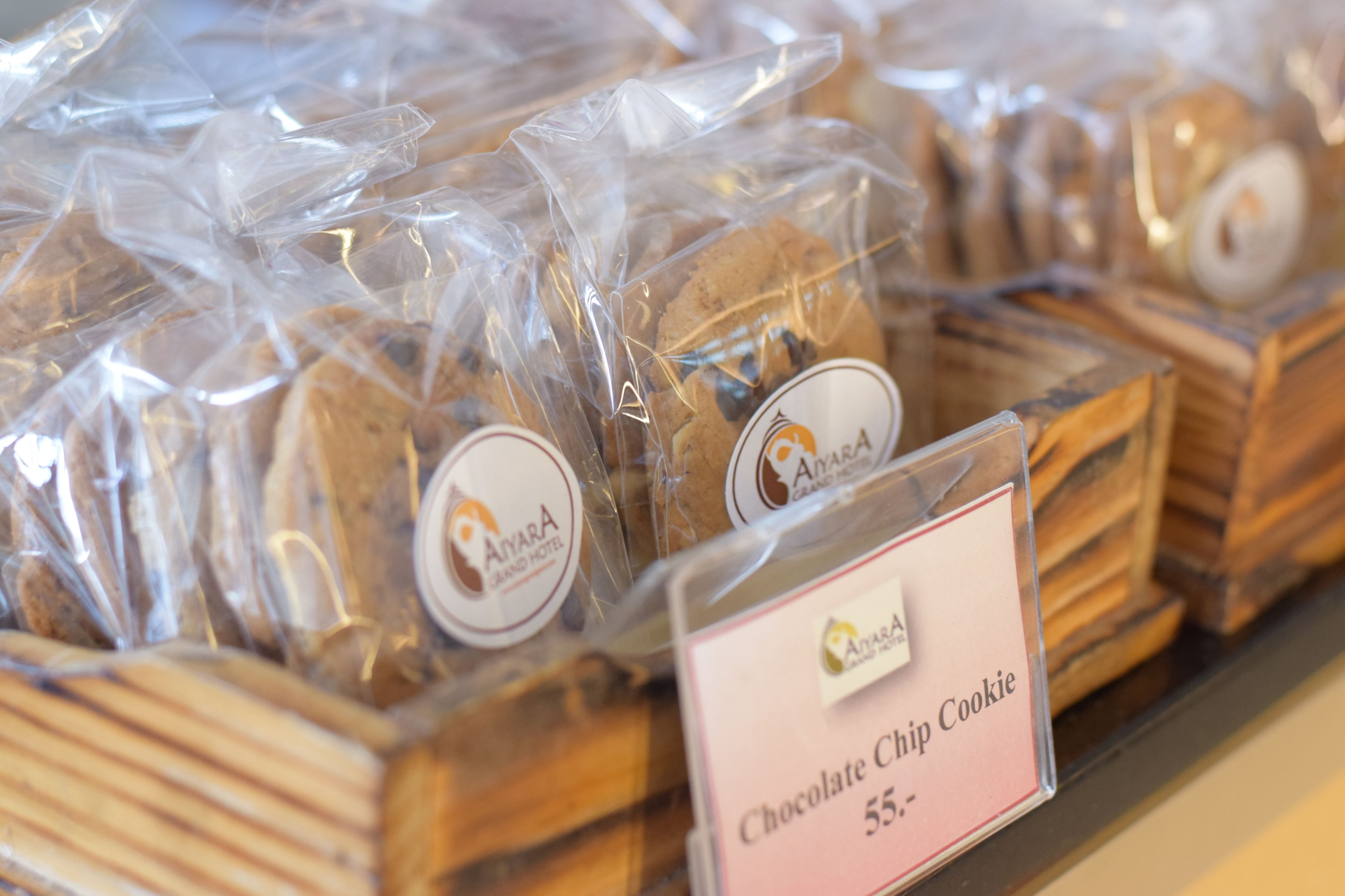 Packaged chocolate chip cookies labeled with a price tag.