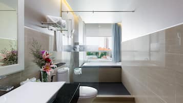 Deluxe with Bathtub | Bathroom | Deep-soaking bathtub, free toiletries, hair dryer, bathrobes