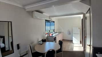 Family Apartment, 1 Bedroom | In-room dining