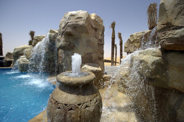 Outdoor pool, pool umbrellas, sun loungers