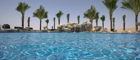 Outdoor pool, pool umbrellas, pool loungers