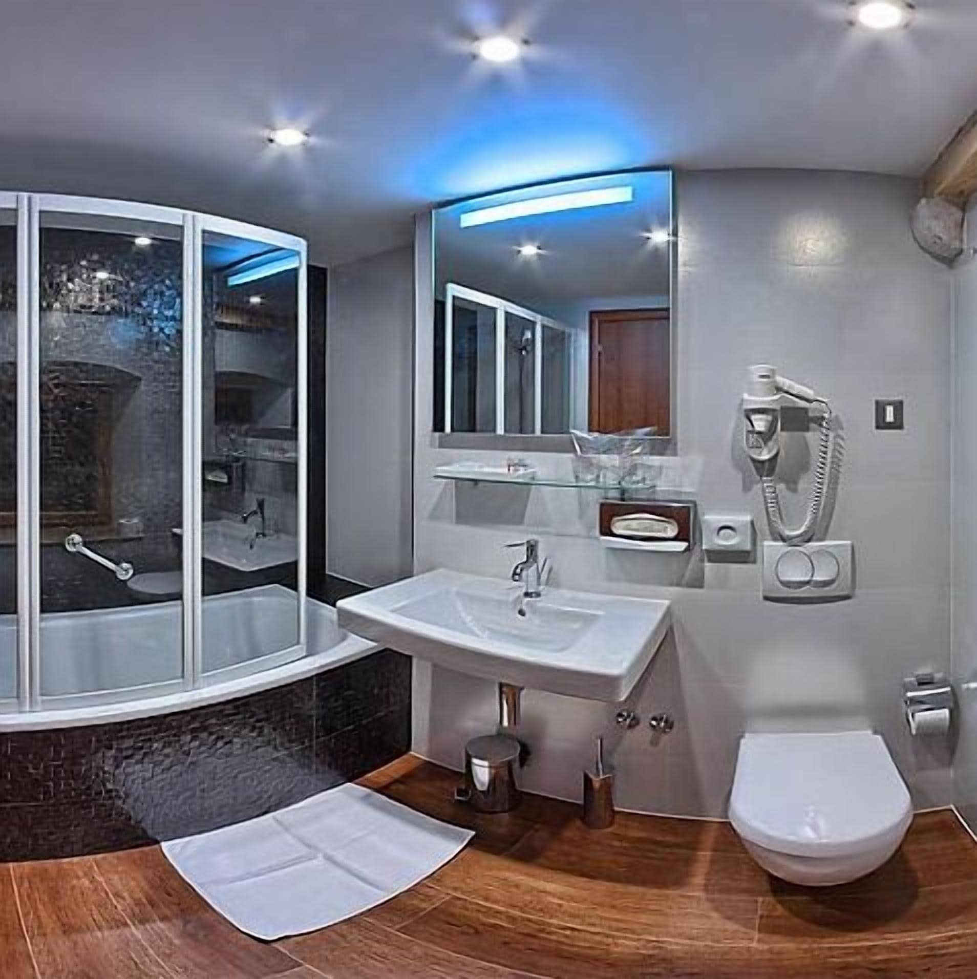 standard double room | bathroom | deep-soaking bathtub, rainfall showerhead, free toiletries, hair dryer